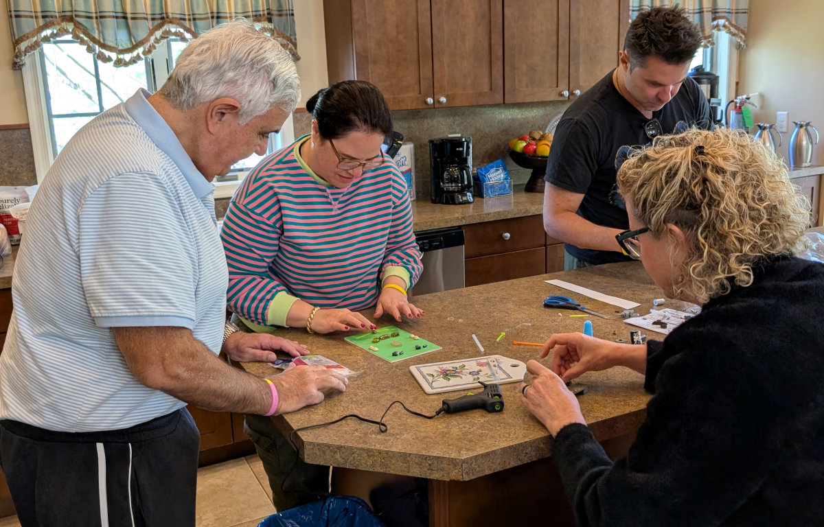 A group collaborating around the materials